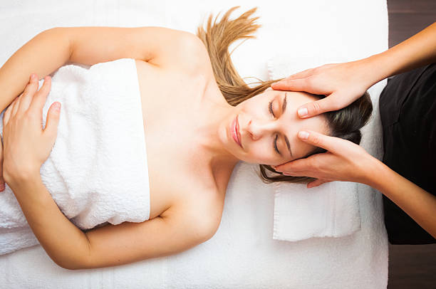 Beautiful woman having an head massage